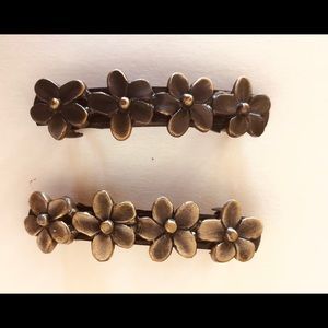 Two small sized metal flower clip